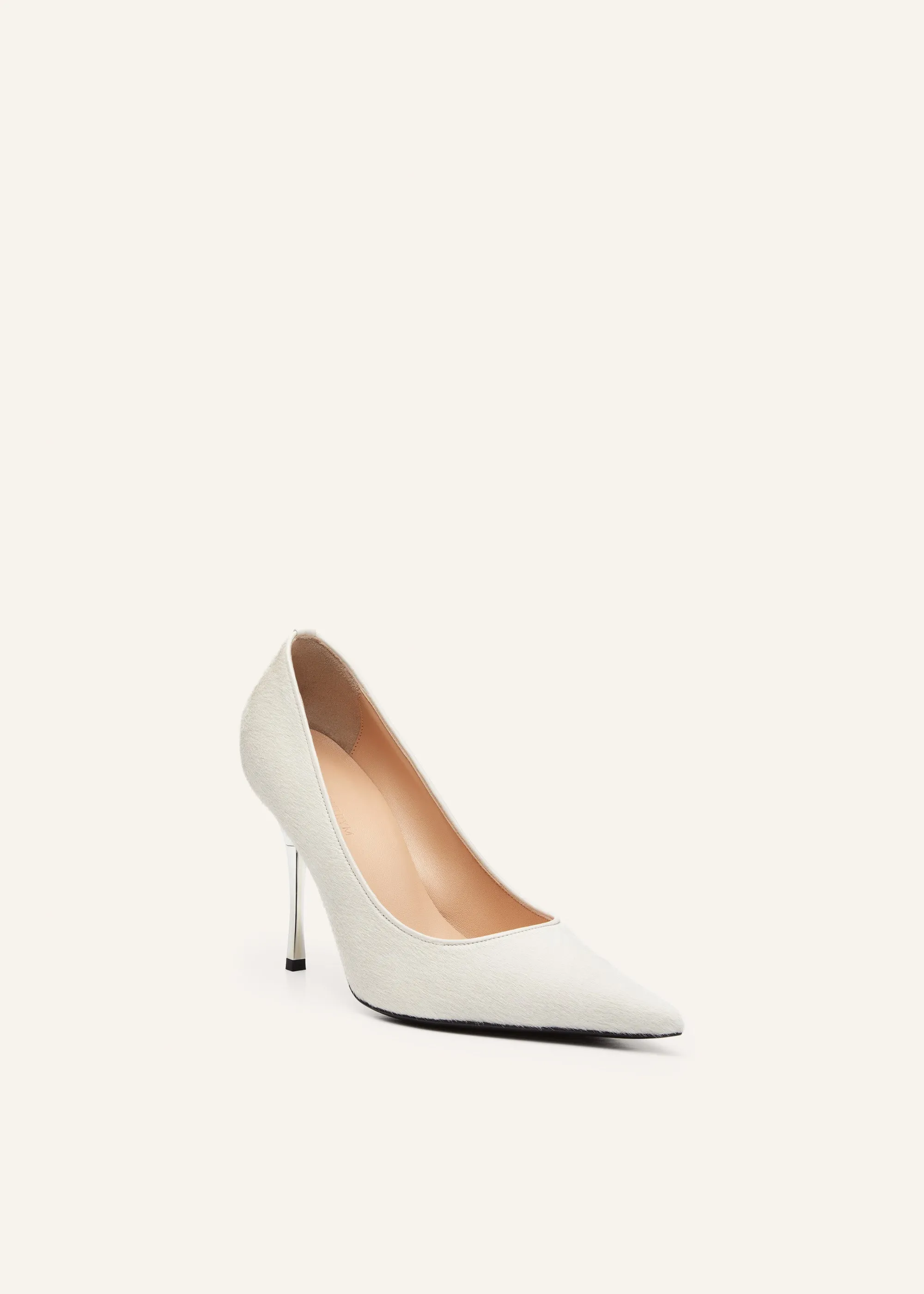 Pointed-toe pumps in white pony hair