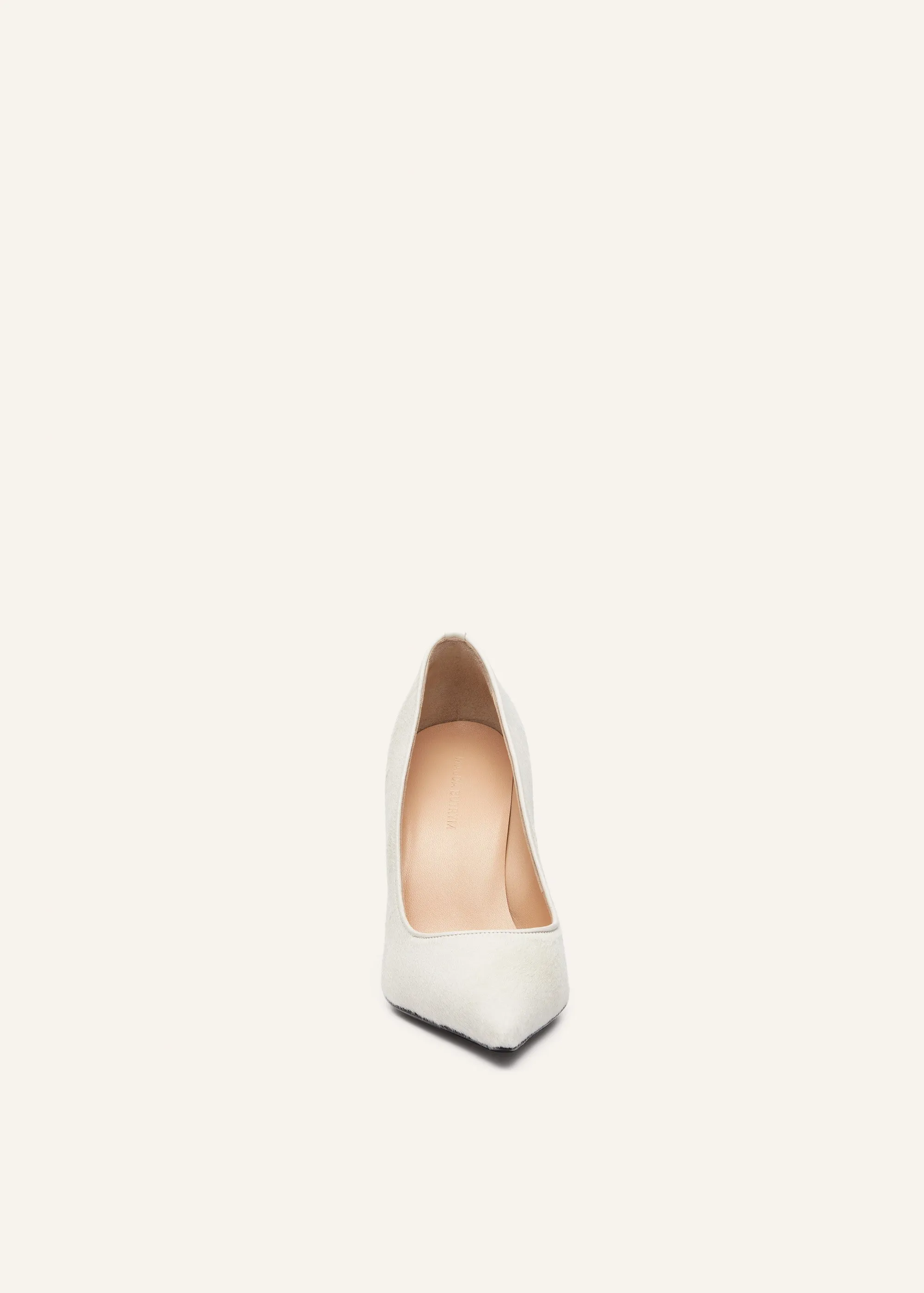 Pointed-toe pumps in white pony hair